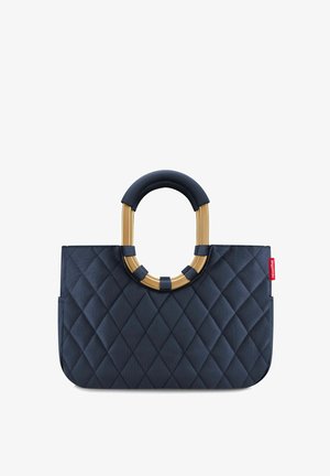 Quilted navy handbag featuring a rounded gold-tone handle with textured accents. Rectangular shape with a side pocket detail.