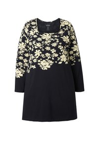 Zwarte lange mouwen tuniek met een vierkante halslijn, met een crèmekleurig bloemenpatroon op de borst en schouders. Zachte katoenen textuur.