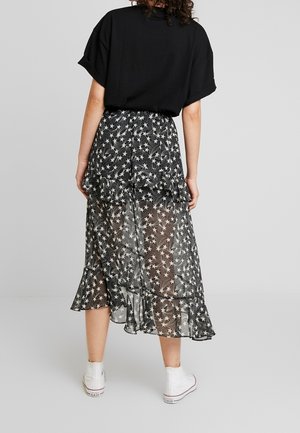 Falda acampanada - black