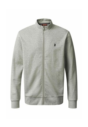 Helehall zip-up jope püstkrae, pikkade varrukate, soonikkoes mansettide ja vasaku rinna väikese musta tikitud logoga.