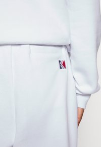 Karl Kani ESSENTIAL TRACKSUIT SET UNISEX - Treningsdress - white
