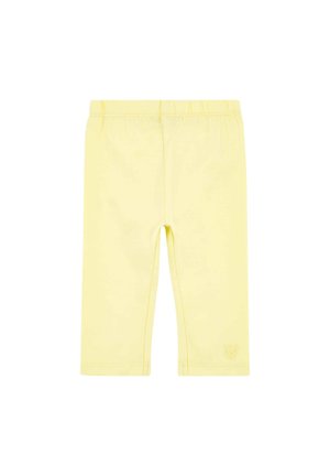 Yellow, stretchy leggings made of soft material, featuring an elastic waistband and a small logo on the lower hem. Fitted design, ankle-length.