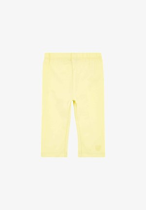 Mallas amarillas y elásticas hechas de un material suave, con una cintura elástica y un pequeño logo en el bajo. Diseño ajustado, de longitud hasta el tobillo.