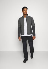 Vaude MENS WINTRY JACKET IV - Giacca softshell - black