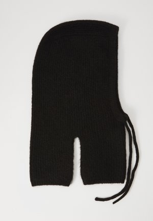 Black knitted balaclava with openings for eyes and mouth, featuring side ties for adjustment, laid flat on white background.