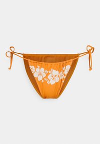 Oranžen bikini spodnji del z belim vzorcem hibiskusa. Ima nastavljive zanke na straneh in gladko teksturo.