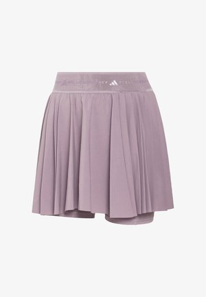 Jupe de sport plissée de couleur violet clair avec short intégré et large ceinture élastique arborant un logo Adidas discret.