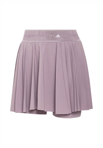 Light purple pleated athletic skirt with built-in shorts and wide elastic waistband featuring subtle Adidas logo.