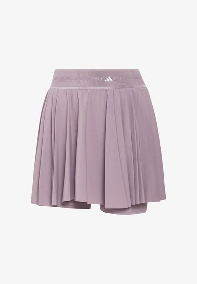 Lys lilla plisseret atletisk nederdel med indbyggede shorts og bred elastisk talje med subtil Adidas-logo.