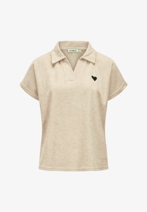 Beige short-sleeve terry cloth shirt with open collar and small black heart emblem on left chest.