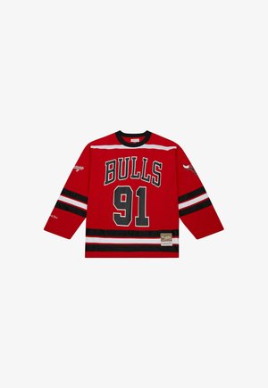 Red jersey featuring "BULLS" and "91" in black. Designed with long sleeves, horizontal white and black stripes, and a logo patch at the hem.