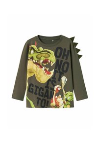 Langärmliges grünes Shirt mit einem großen Dinosaurier-Print, auffälligem Text und stacheligen Applikationen an der Schulter. Weicher Stoff, lässiges Design.