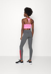 adidas Sportswear Leggings - dark grey/vivid red