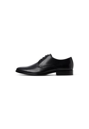 Zapato de vestir de cuero negro con un diseño elegante de punta redonda, cierre de cordones de cinco ojetes, tacón bajo y costuras mínimas para una textura suave.