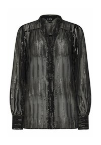 Blusa nera semi-trasparente con strisce orizzontali metalliche, maniche lunghe, chiusura con bottoni e polsini decorati con abbellimenti.