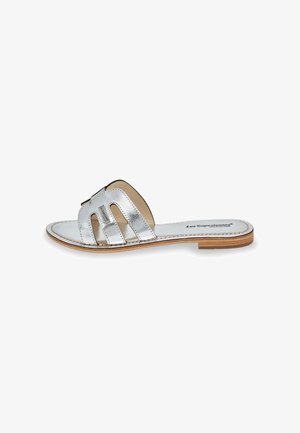 Silver metallic slide sandal with three cut-out straps, leather insole, and wooden sole. Simple design emphasizes the shiny finish.