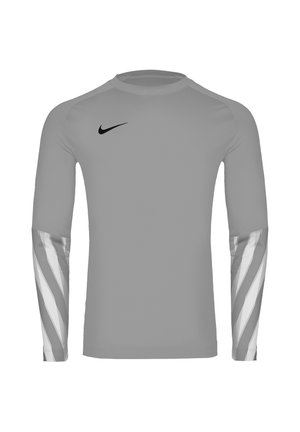 Szara sportowa koszulka z długim rękawem z czarnym logo Nike na piersi i białymi ukośnymi paskami na dolnych rękawach.