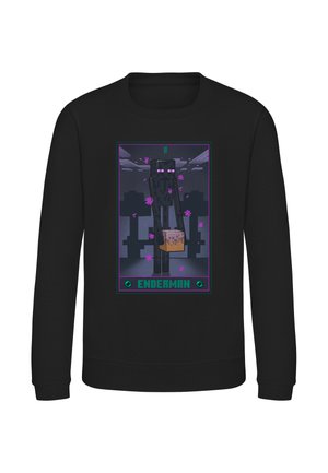 Sort sweatshirt med pixelated Enderman-figur, der holder en blok, omgivet af lilla partikler og ordet "ENDERMAN" nedenfor.