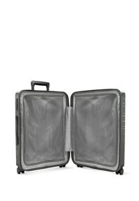 Valise rigide en vert olive, dotée d'une poignée rétractable, de quatre roues et d'un intérieur en maille avec un diviseur central pour une meilleure organisation.