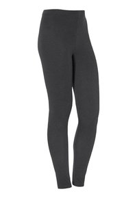 Zwarte leggings van rekbaar materiaal met een gladde textuur, voorzien van een hoge tailleband en een getailleerd silhouet over de benen.