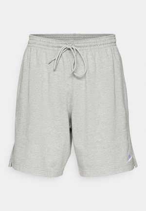 Grå atletiske shorts lavet af blød stof, med elastisk talje med snøre og et lille logo i nederste venstre hjørne.