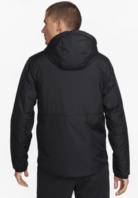 Nike Performance UNLIMITED - Jakna za nošenje na otvorenom - black black