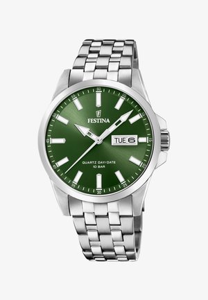 Orologio da polso in metallo argento con quadrante verde, indici e lancette bianchi, display giorno/data che mostra martedì 6.