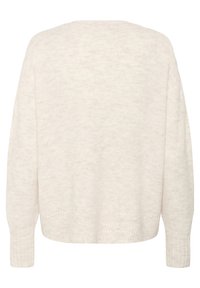 Ljusbeige tröja med en avslappnad och lös passform, med ribbade muddar och nederkant. Mjuk, texturerad stickad kvalitet med en subtilt mönster.
