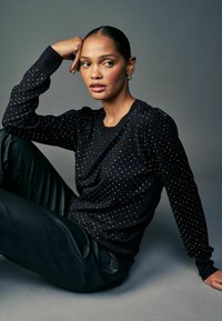 Next Pullover - black sparkle