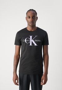 Calvin Klein Jeans SEASONAL MONOLOGO TEE - Marškinėliai su spaudiniu - black/pastel lilac