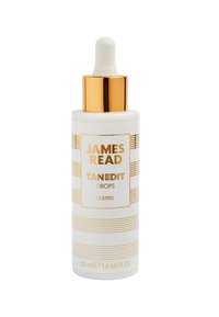 Weißes Fläschchen mit goldenen Akzenten und detaillierten Streifen, ausgestattet mit einem Pipettendeckel. Auf dem Etikett steht "JAMES READ TANEDIT DROPS," Größe 50 ml.