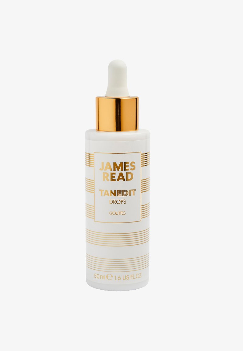 White bottle with gold accents and detailed stripes, featuring a dropper top. Label reads "JAMES READ TANEDIT DROPS," 50 ml size.