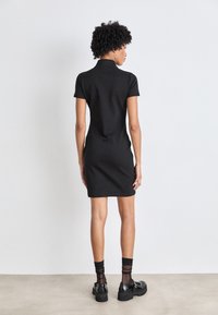 HUGO NALAYLA - Robe fourreau - black