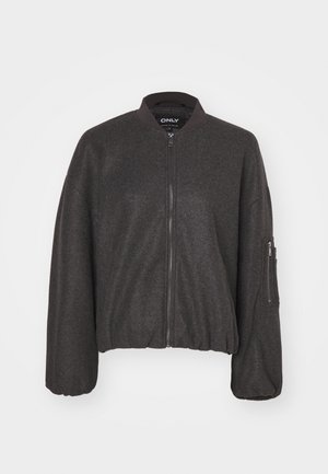 Dunkelgraue Bomberjacke mit Reißverschluss vorne, geripptem Kragen und elastischem Saum. Mit übergroßen Ärmeln und einer Reißverschlusstasche am linken Arm.