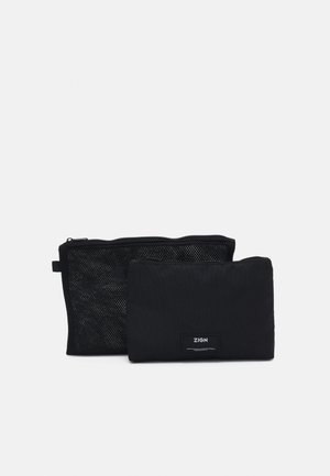 Trousse - black