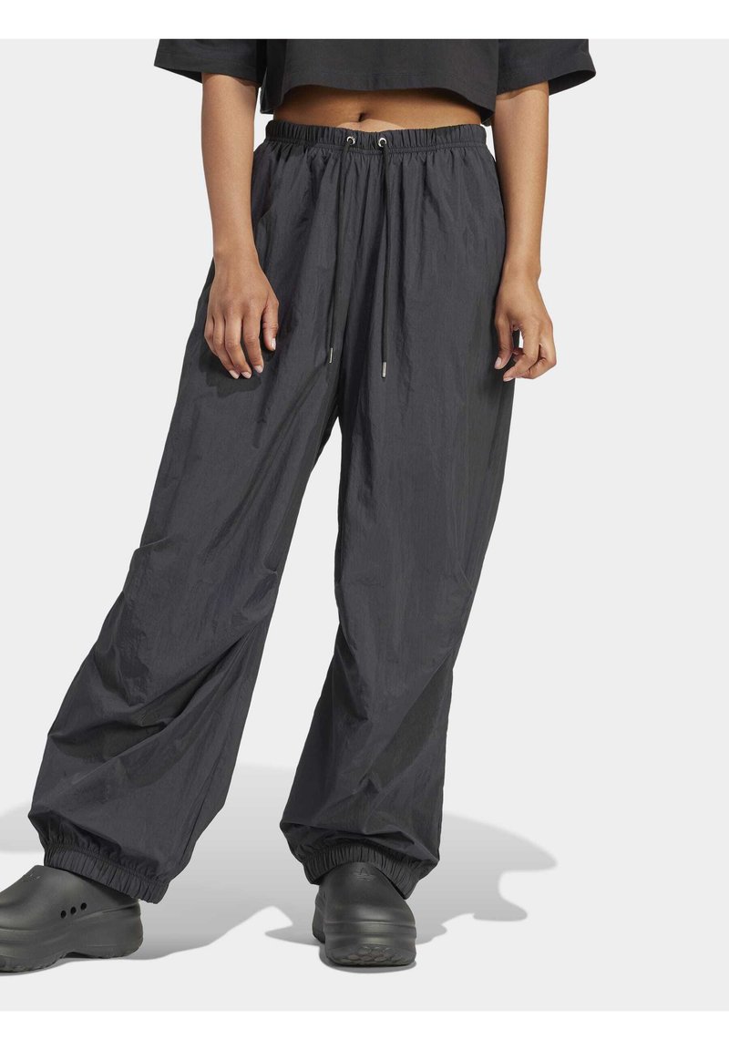 adidas Originals - PREMIUM ESSENTIALS PARACHUTE PANTS - Tracksuit bottoms - black, Enlarge