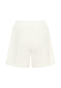 Shorts blancs à taille élastique avec une coupe ample et un tissu lisse, vus de dos sur fond blanc.