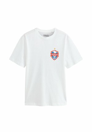 Hvid T-shirt med korte ærmer med en lille Peanuts-fodboldlogo med Snoopy og en fodbold på venstre bryst.