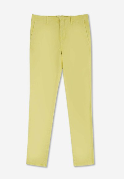 Pantaloni in cotone giallo chiaro con vestibilità slim, dotati di tasche laterali e una superficie liscia. Design semplice senza decorazioni.
