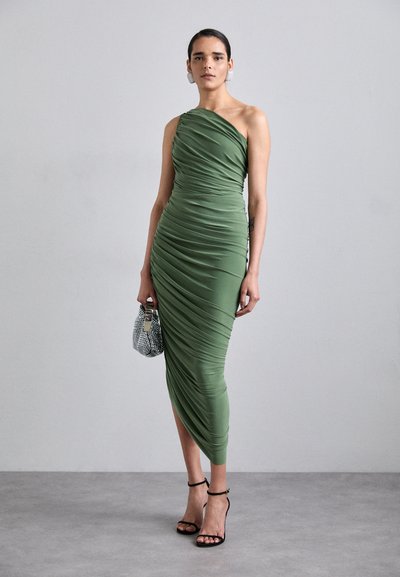 One-shoulder, fitted dress in olive green with ruched detailing. Pairing with a metallic handbag and black ankle strap heels.