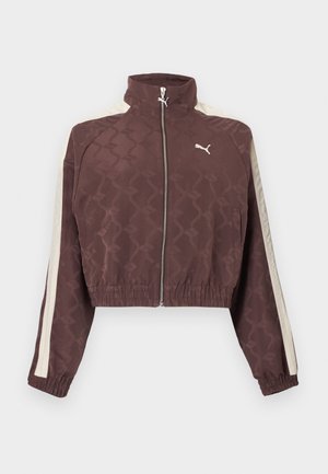 Hnědá krátká bunda Puma s bílými postranními pruhy, předním zipem, elastickými manžetami a lemem a vysokým límcem.