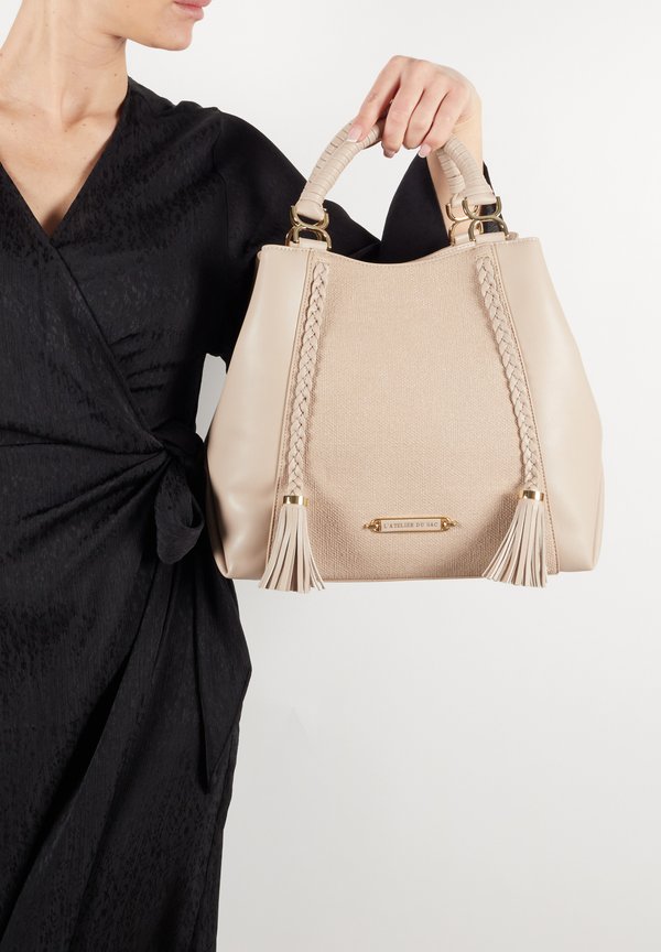 REGINA - Handtasche - sand rose