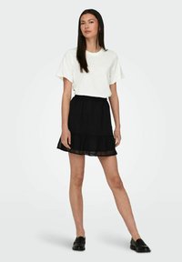 JDY GERÜSCHTER - Falda acampanada - black