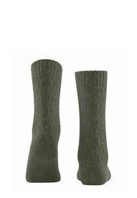 Olivgrüne Socken mit einem gerippten Bündchen, gefertigt aus strukturiertem Material, in mittellanger Knöchelhöhe und mit einem schlichten, nahtlosen Design.