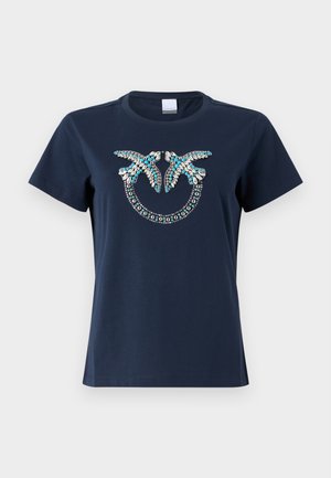 Navyfarbendes Baumwoll-T-Shirt mit einem verzierten Design von Vögeln aus türkisfarbenen und silbernen Pailletten. Kurze Ärmel, Rundhalsausschnitt, lockere Passform.