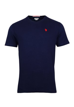 T-shirt à manches courtes, couleur marine, en coton. Il présente un petit logo rouge brodé sur la poitrine gauche et un col rond classique.