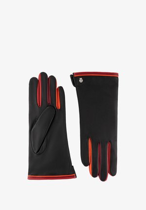 Schwarze Lederhandschuhe mit rot-orangefarbenen Akzenten, die Vorder- und Rückseite zeigend, mit einem kleinen silbernen Emblem am Handgelenk.