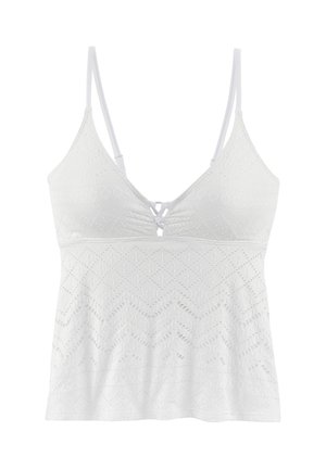 White sleeveless top with thin adjustable straps, eyelet lace pattern, and small decorative crisscross detail at the chest.