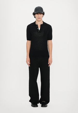 FLUFFY UNISEX - Polo - black