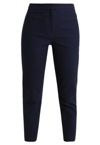 Pantalon ajusté bleu marine avec une finition texturée. Présente une coupe droite, une fermeture éclair à l'avant et des passants de ceinture. Pas de poches visibles.